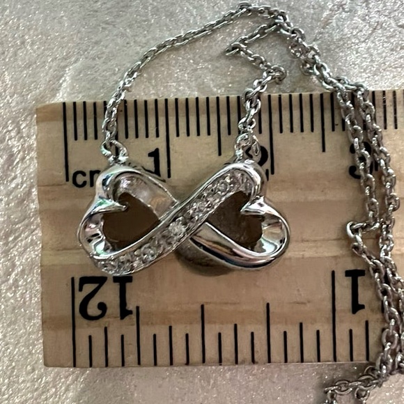 Silver Hearts Infinity Symbol Pendant Necklace with simulated Diamond accents - Picture 13 of 13